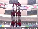 Human tower collapses.