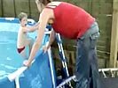 Mother cracks spine in pool jump fail