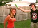 Idiot breaks beer bottle on his girlfriend's head!