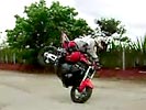 Amazing 180 degree endo on motorcycle.