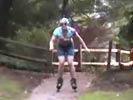 Downhill rollerblade stunt results in brutal faceplant.
