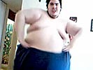 Disgusting fat bastard dancing on 'My Humps'.
