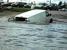 Idiot causes his van to sink in very dumb stunt.