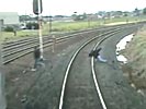 Kid slips in front of an uncoming train.