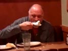 Drunk man eats napkin.