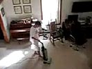 Kid freaks out over vacuum cleaning. WTF! this family belongs in a zoo.